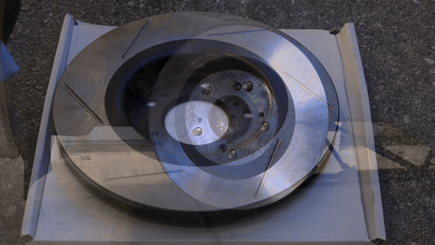 Illustrates cleaning the new rotor and hub.