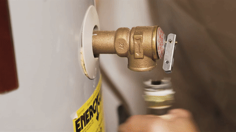 Safely removing the old water heater and preparing to install the new one.