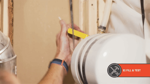 Checking for leaks after turning on the water supply.