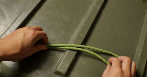 Shows the initial steps of forming a figure eight loop by draping and wrapping the bight.