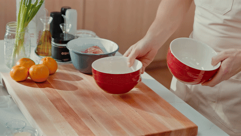 Shows adding flour, cornstarch, and salt to a bowl.