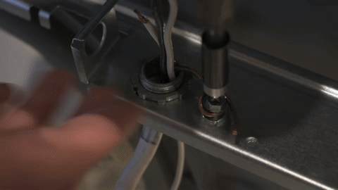 Shows the installation of electrical connections using wing caps.