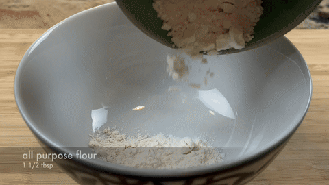 Shows mixing of dry ingredients for the batter.