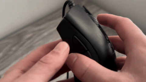 Shows blowing air between the gaps of the mouse wheel.