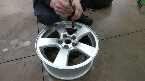 Demonstrates removing and replacing the valve stem.