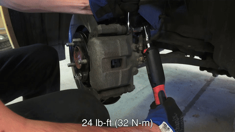 Shows the reinstallation of wheels.