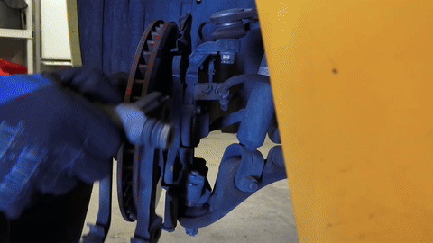 Shows the removal of the brake rotor.