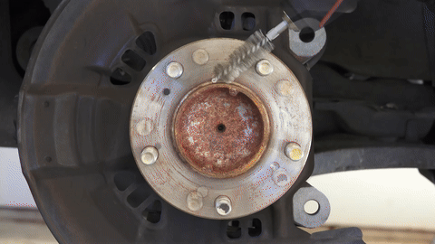 Shows the installation of the new rotor.