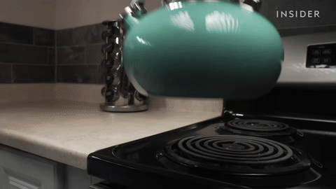 Shows water boiling in a kettle.
