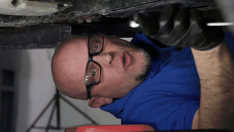 Removal of the old oil filter and installation of the new one with lubrication.