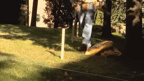 Shows the setup of Mason's lines with string and stakes.
