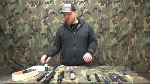 Demonstration of folding paper to achieve the correct angle.