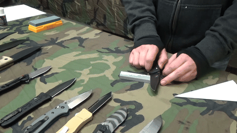 Checking the sharpness of the blade after sharpening.