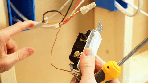 Connecting the power wire to the common terminal.