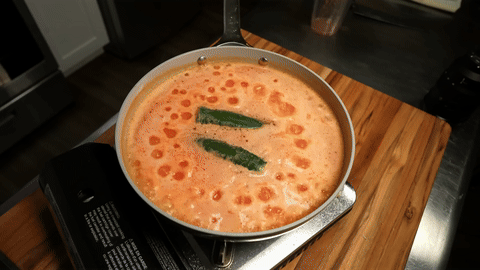 Bringing the rice to a boil and then covering it to cook.