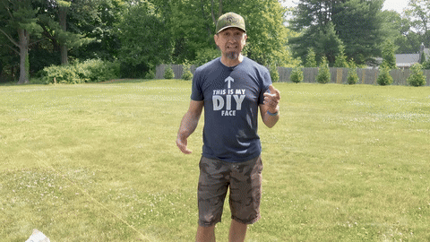 Demonstrates digging the hole with a shovel and auger, showing the required depth and circumference.