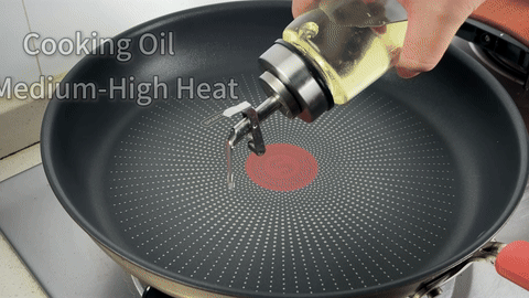 Shows the beef being seared in a pan until medium-well.